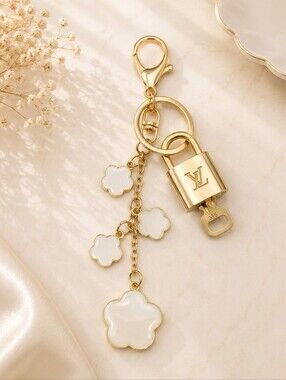 Authentic Louis Vuitton Lock & Key with Unbranded Flower Charm, Keychain